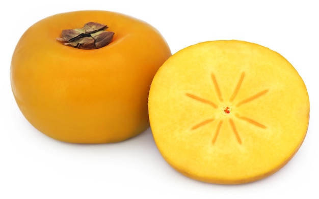 Fresh persimmon over white background