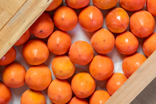 fresh persimmon wooden crate top view b