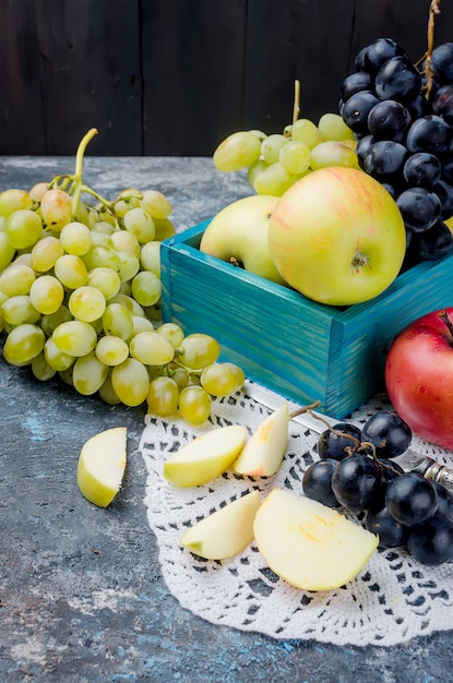 Fresh picked apples and grapes and fruits pastille 