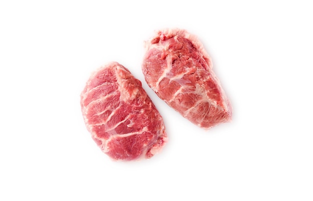 Fresh piece of meat cut from the Iberian pork cheek on white background