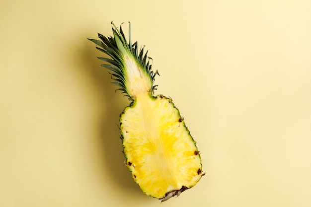 Fresh pineapple cut creative flat lay