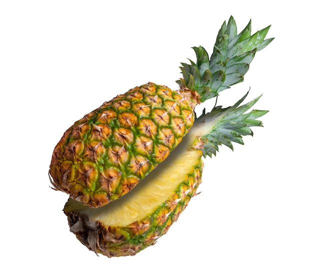 Fresh pineapple cut into two pieces isolated from the background