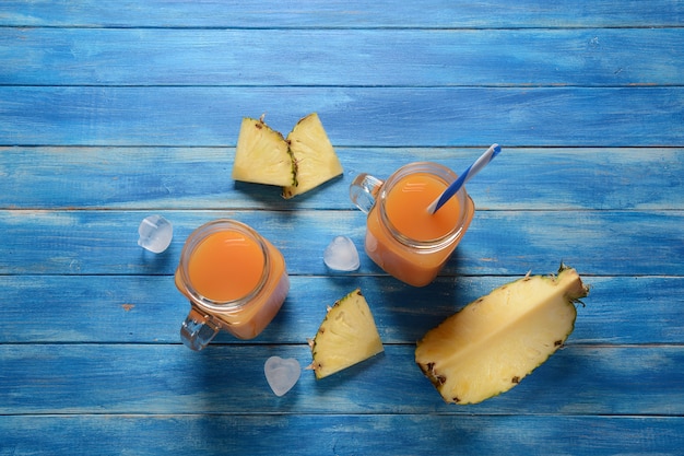 Fresh pineapple and mango cocktail in glasses