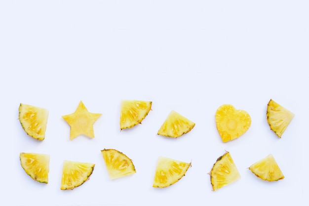 Fresh pineapple slices on white background. 