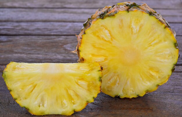 Fresh pineapple on a wooden table