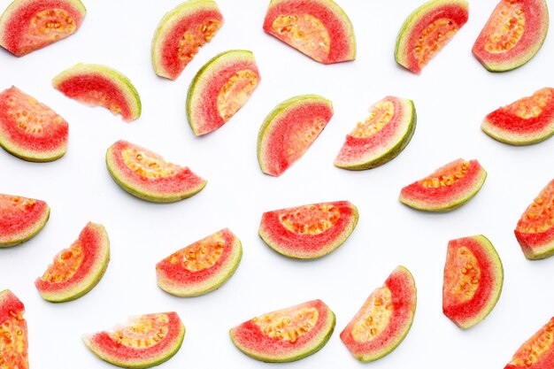 Fresh pink guava on white background.