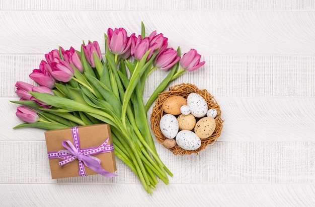 Fresh pink tulip flowers and easter eggs