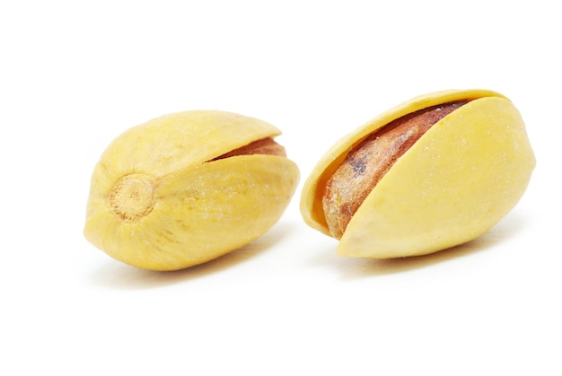 Fresh pistachios isolated on a white background