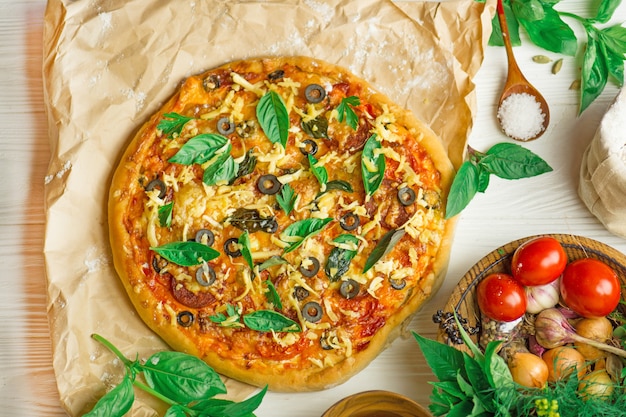  Fresh pizza with tomato and mushrooms