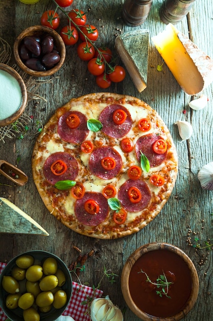 Fresh pizza on wood