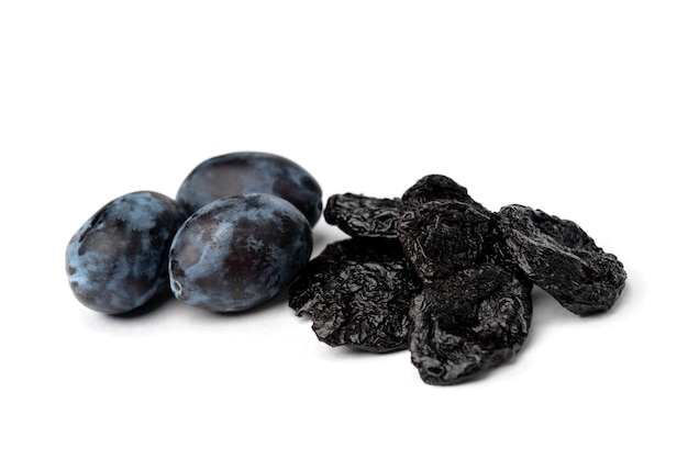 Fresh plum and prune isolated