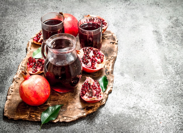 Fresh pomegranate juice in a glass jug.