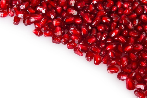 Fresh pomegranate seeds closeup background