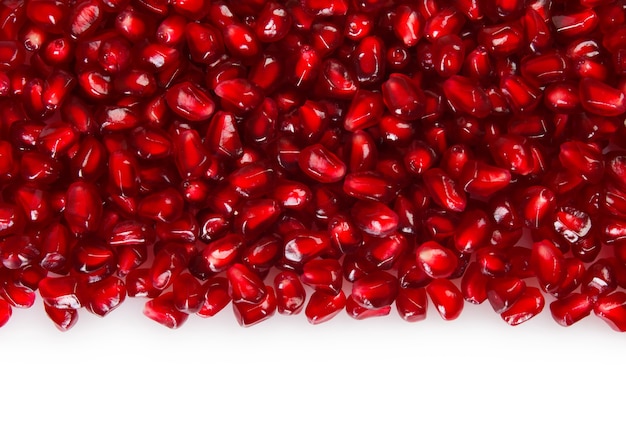 Fresh pomegranate seeds closeup background