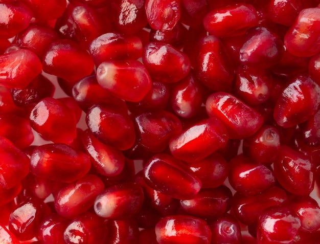 Fresh pomegranate seeds for food background