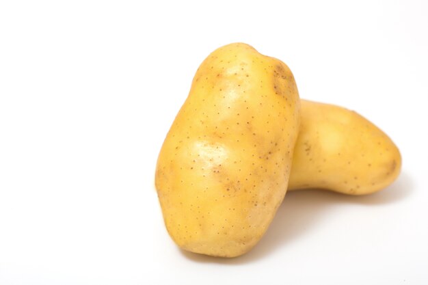 Fresh potato on white background.