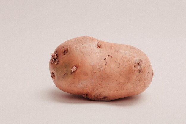 Fresh potato on white background