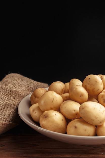 Fresh potatoes in basket