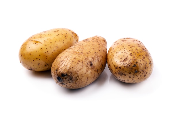 Fresh potatoes isolated on a white background.