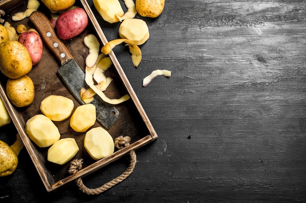 Fresh potatoes on a tray