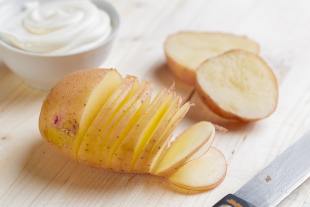 Fresh potatoes on the wood