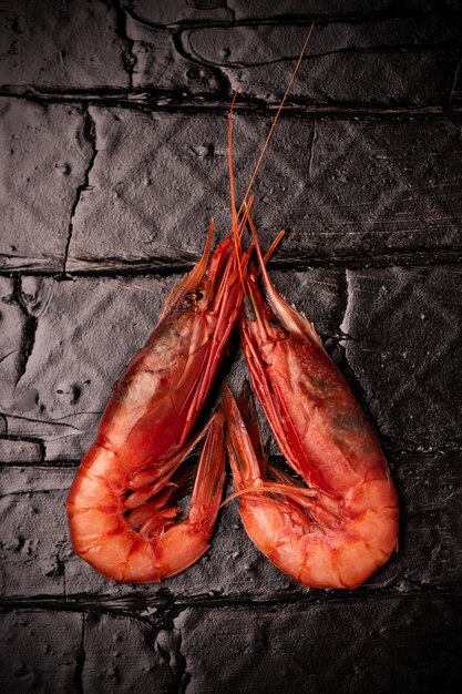 Fresh Prawns from Mazara del Vallo on black background close up