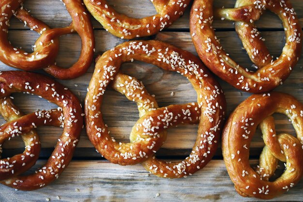 Fresh pretzels on a wooden surface