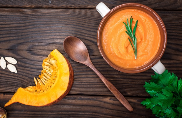 Fresh pumpkin soup in a ceramic plate