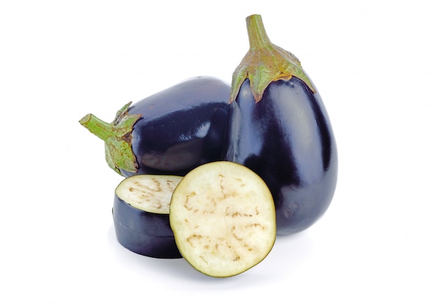 Fresh purple eggplant isolated on white wall