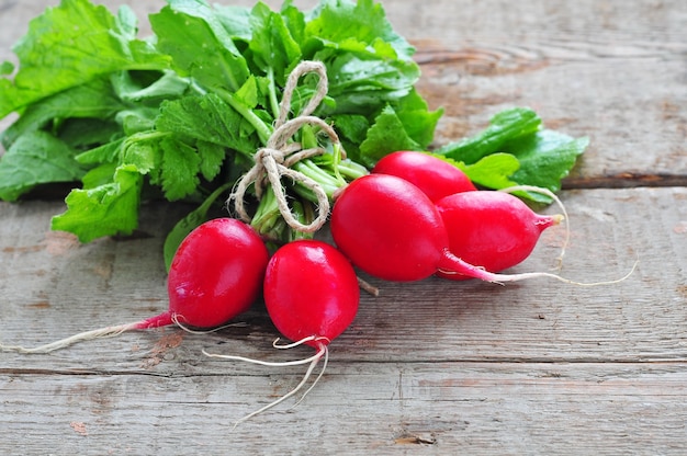 Fresh radish on wooden table