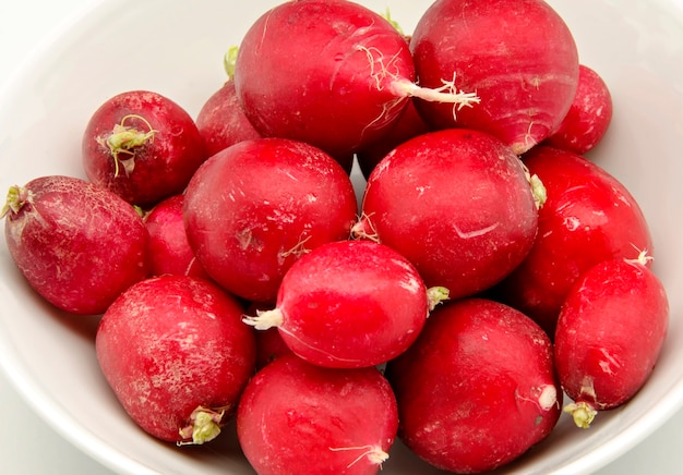 Fresh radishes in a bowl