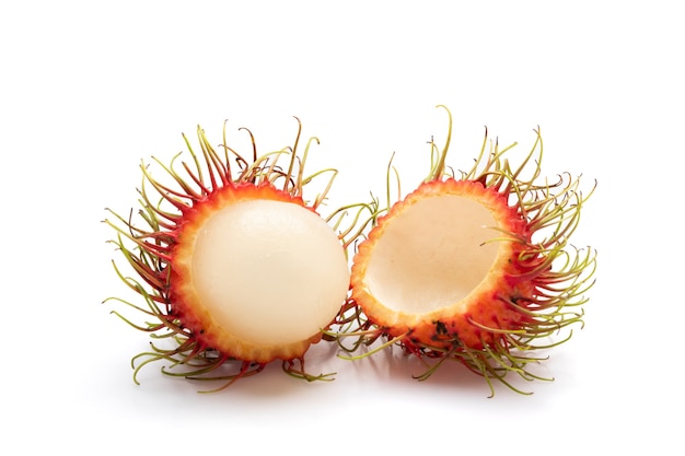 Fresh rambutan, a sweet tropical fruit, isolated on white background.