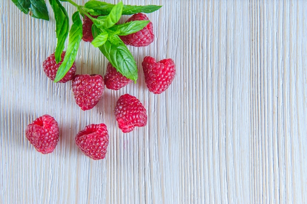 Fresh raspberries background closeup photo