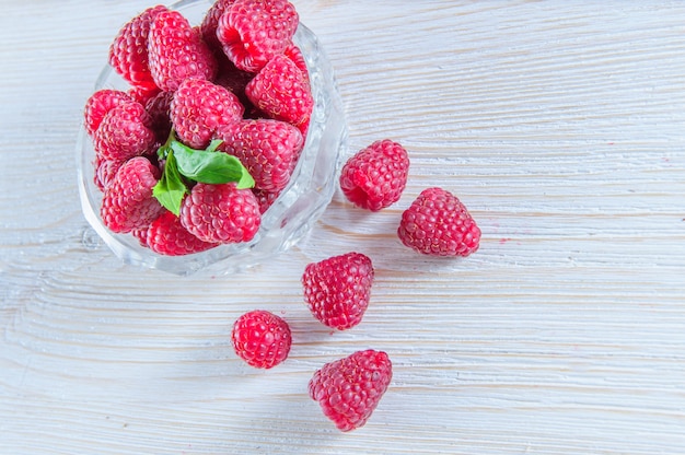 Fresh raspberries background closeup photo