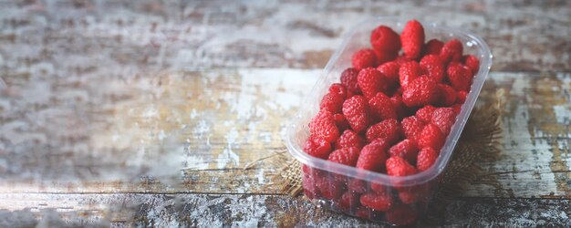 Fresh raspberries in a tray