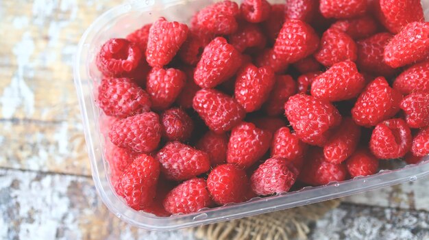 Fresh raspberries in a tray