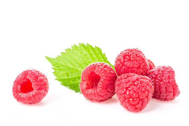 fresh raspberries with leaves isolated.