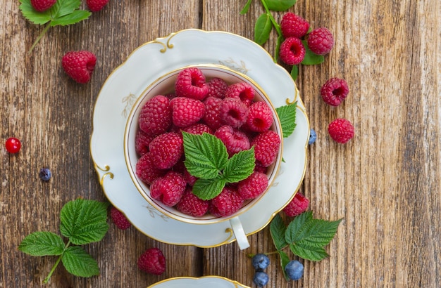 Fresh raspberry in cup