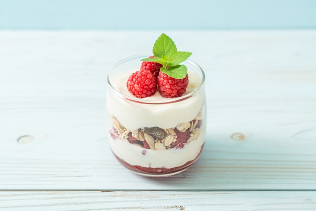 fresh raspberry and yogurt with granola - Healthy food style