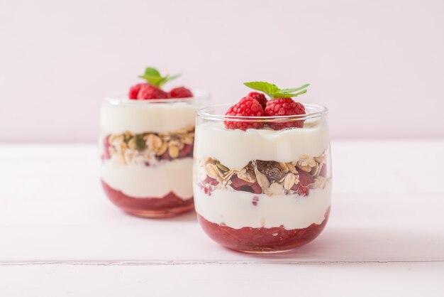 fresh raspberry and yogurt with granola - Healthy food style