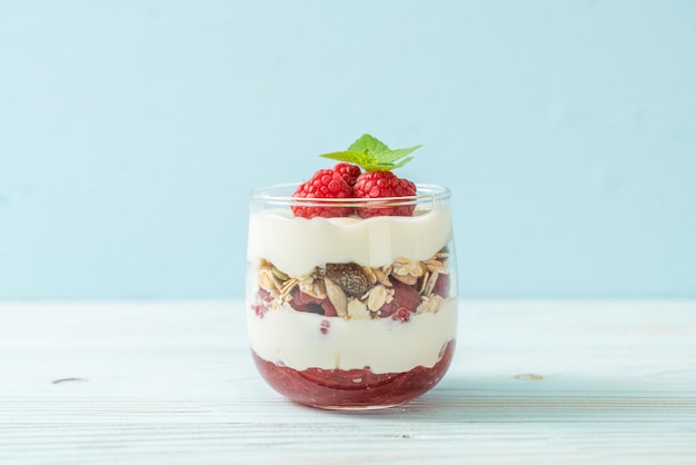 fresh raspberry and yogurt with granola - Healthy food style