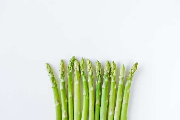 Fresh raw asparagus, top view, copyspace