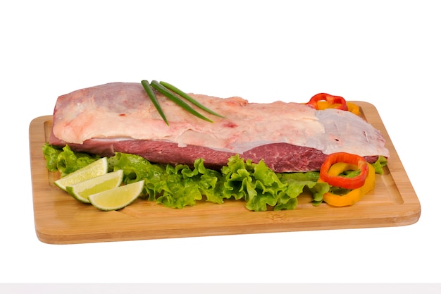 Fresh and raw beef meat on cutting board on white background.