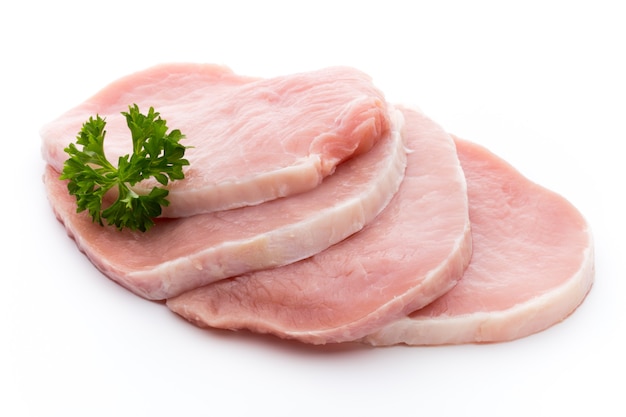 Fresh raw beef steak isolated on white background, top view.