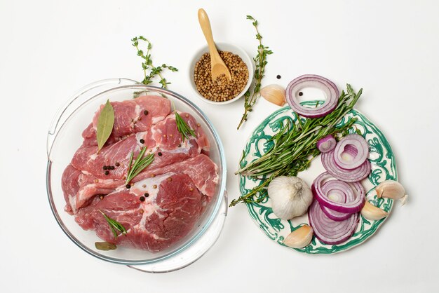 Fresh raw beef steak with spices isolated