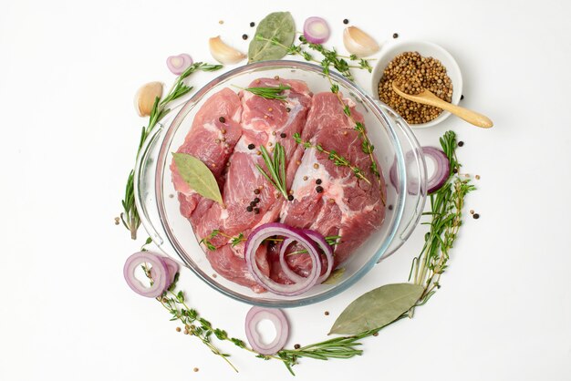 Fresh raw beef steak with spices isolated