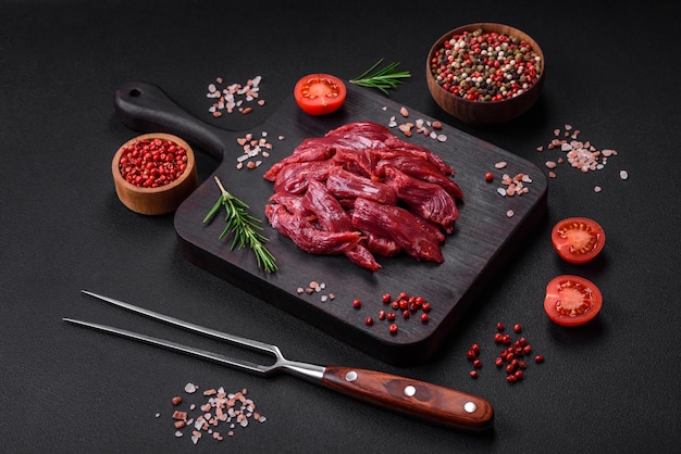 Fresh raw beef with salt spices and herbs