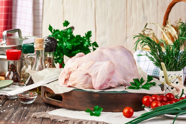 Fresh raw chicken carcass on the table