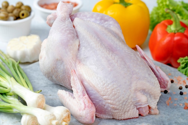 Fresh and raw chicken in the table