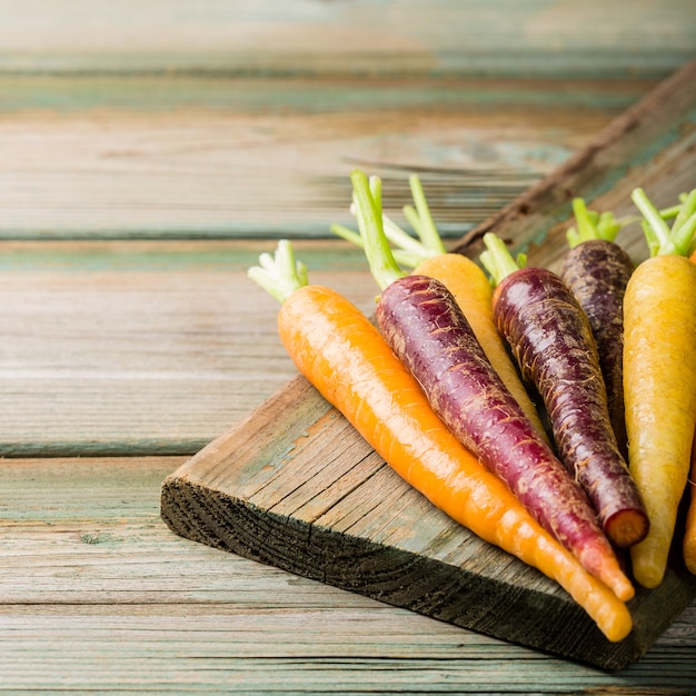 Fresh raw colorful carrots roots